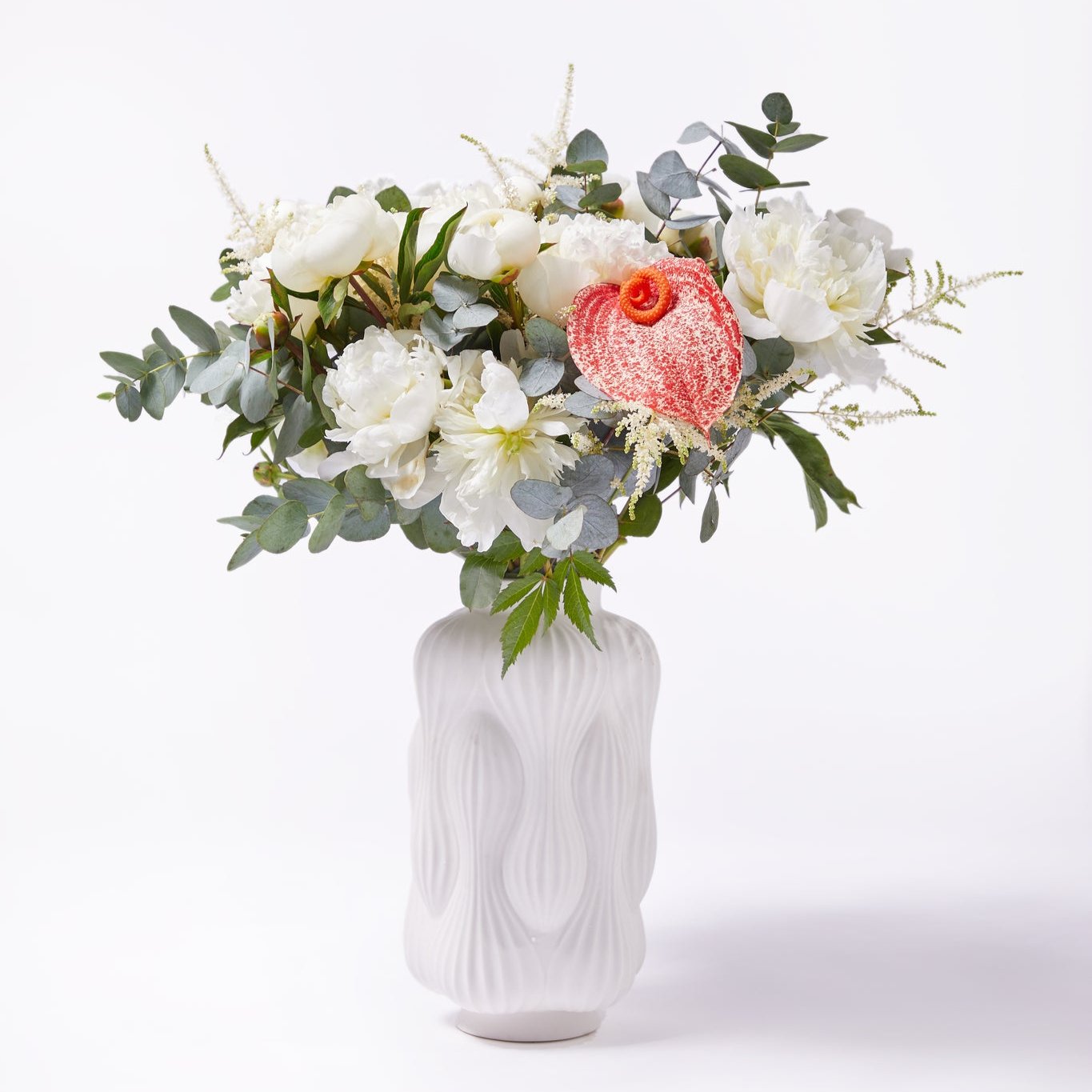 White ceramic vase with white peonies an d flowers elegant and luxury with white background